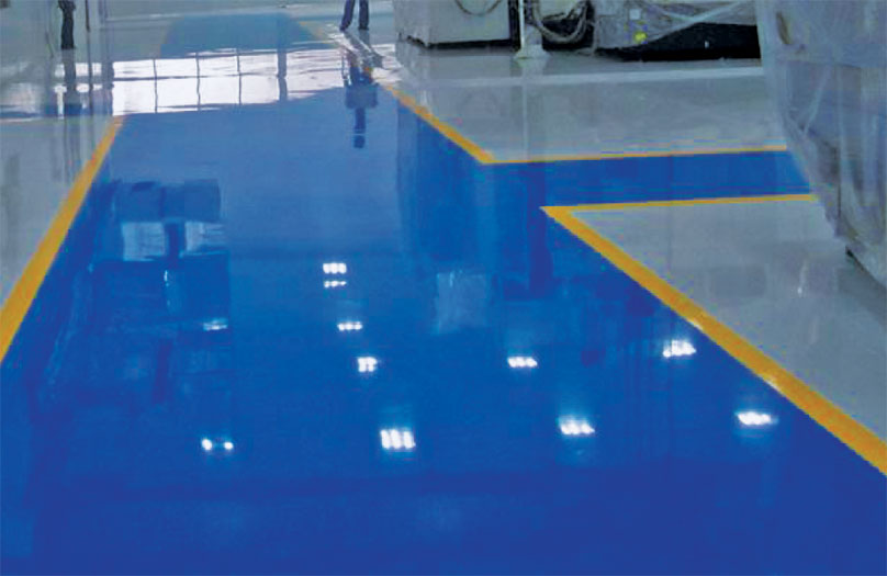 Self-smoothing epoxy based flooring system